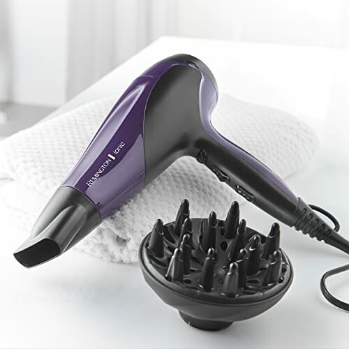 Remington hair dryer with diffuser attachment on a table
